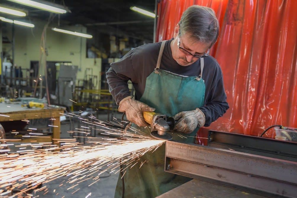 Craftsman at work in a Watauga County manufacturing facility